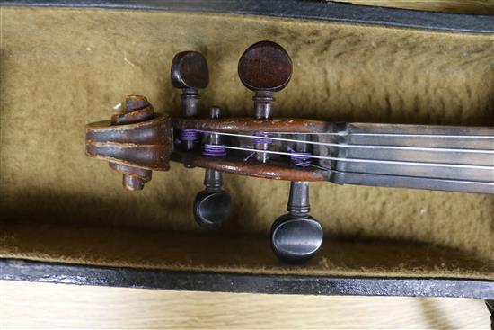 A mandolin and a cased violin